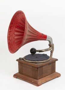 A vintage wind up gramophone with red horn, early 20th century, 64cm high