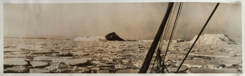 THE B.A.N.Z. ANTARCTIC EXPEDITION: Official original photograph by Captain Frank Hurley: Image A47 - Title: "New Discoveries in Antarctica", with official "MAWSON ANTARCTIC EXPEDITION" handstamp and release date "TUESDAY APR 29, 1930" verso, together with