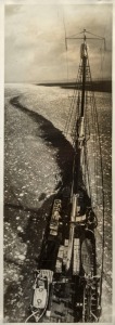 THE B.A.N.Z. ANTARCTIC EXPEDITION: Official original photograph by Captain Frank Hurley: Image A40 - Title: "Heading South on the Lone Trail", with official "MAWSON ANTARCTIC EXPEDITION" handstamp and release date "MONDAY MAY 5, 1930" verso, together with