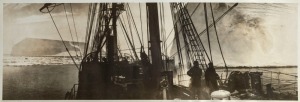 THE B.A.N.Z. ANTARCTIC EXPEDITION: Official original photograph by Captain Frank Hurley: Image A55 - Title: "And ice, mast high, came floating by as green as emerald", with official "MAWSON ANTARCTIC EXPEDITION" handstamp and release date "TUESDAY MAY 6, 