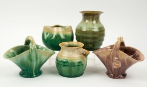 REMUED two pottery basket vases, a green glazed vase with branch handle, and two green glazed vases, (5 items), with blue, mauve and cream glazes, the largest 12.5cm high