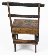 An antique Australian folk art timber chair with remains of yellow painted finish, 19th century,  75cm high, 49cm across the back - 2