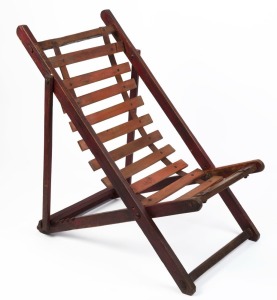 An Australian folk art folding chair with red painted finish, leather strapping and timber slats, 19th century,  ​​​​​​​102cm high, 61cm wide
