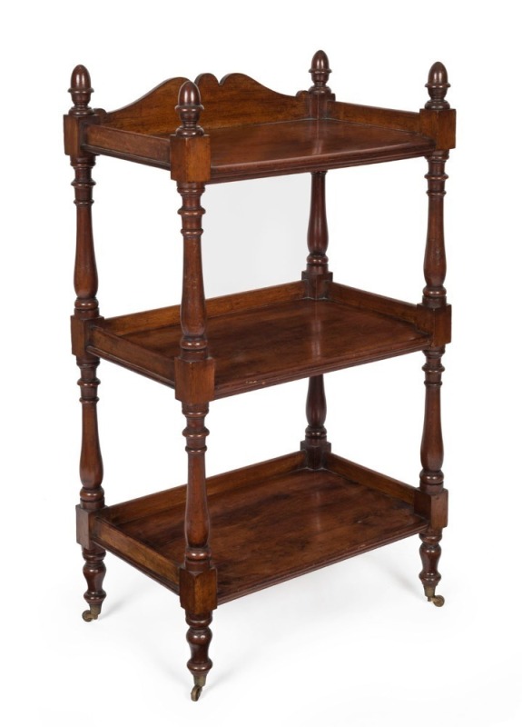 An antique Colonial Australian cedar three tier whatnot servery with full turned columns and extra ring turning, New South Wales origin, circa 1855, 107cm high, 61cm wide, 40cm deep