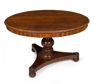 A Colonial Australian cedar supper table in the Regency style with tri-form platform base adorned with finely turned rondels. New South Wales origin, circa 1835, 75cm high, 124cm diameter