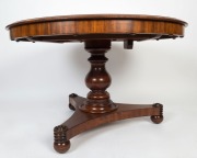 A Colonial Australian cedar supper table in the Regency style with tri-form platform base adorned with finely turned rondels. New South Wales origin, circa 1835, 75cm high, 124cm diameter - 3