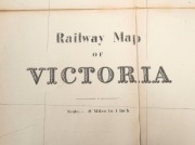 Huge and impressive RAILWAY MAP OF VICTORIA, Scale: 8 MILES to 1 INCH, divided into 32 sections backed on to linen which fold into an attractive black leather cover with gold embossed lettering "RAILWAY MAP OF VICTORIA, C.E. OLIVER, ENG. IN CHIEF, M.M.B. - 4