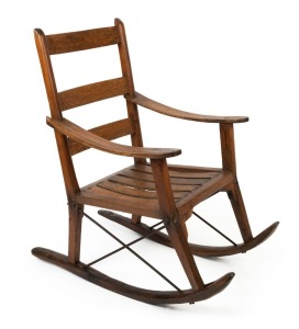 A rustic antique Australian folk art rocking chair, eucalypt, cypress pine and oak with iron fittings, South Australian origin, 19th century, Note: Ex Lord McAlpine Collection, ​​​​​​​104cm high, 59cm across the arms