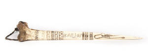 Tribal bone dagger with engraved scrimshaw decoration, late 19th century. 34cm
