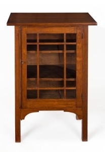 An Australian blackwood music cabinet with a single bar-glazed door and key, circa 1910, ​​​​​​​91cm high, 61cm wide, 38cm deep