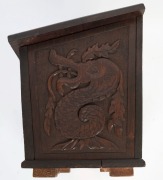 An Australian blackwood fuel box with sloping lift-top, four carved griffin panels and makers ink stamp "J. Fraser, Hyde St. Sth Adelaide", early 20th century, ​​​​​​​48.5cm high, 65cm wide, 40.5cm deep - 3