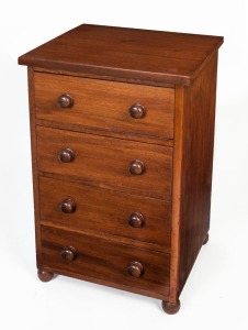 An Australian cedar bedside chest with four drawers and bun feet, early 20th century, ​​​​​​​71.5cm high, 45.5cm wide, 42cm deep