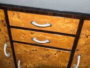 An Austrian Art Deco sideboard,&nbsp;Karelian birch and macassar ebony with black marble top and ivorine handles, circa 1925, 93cm high, 107cm wide, 37cm deep - 3