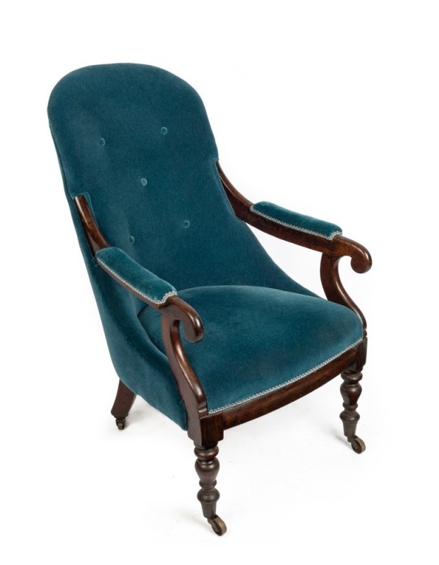 A Colonial Australian cedar easy chair with finely turned legs and scrolled arms, circa 1850,  62cm across the arms 