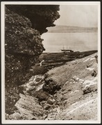 THE B.A.N.Z. ANTARCTIC EXPEDITION: Official original photograph by Captain Frank Hurley: Image A14 - Title: The Discovery, at Kerguelen Island, with official "MAWSON ANTARCTIC EXPEDITION" handstamp and release date "MONDAY FEB.24, 1930" verso, together wi