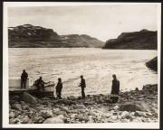 THE B.A.N.Z. ANTARCTIC EXPEDITION: Official original photograph by Captain Frank Hurley: Image A21 - Title: Exploring Kerguelen Island, with official "MAWSON ANTARCTIC EXPEDITION" handstamp and release date "MONDAY FEB.24, 1930" verso, together with the o