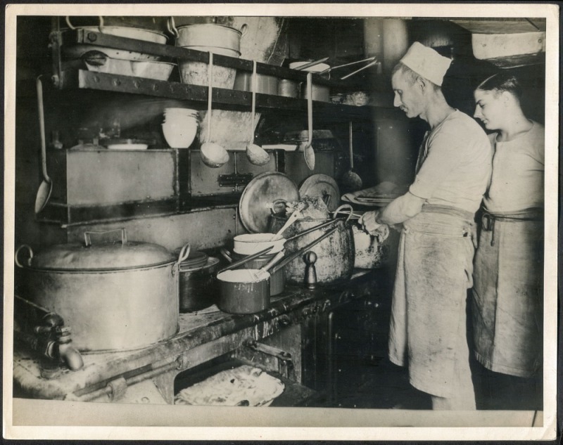 THE B.A.N.Z. ANTARCTIC EXPEDITION: Official original photograph by Captain Frank Hurley: Image A32 - Title: A Tough Problem, with official "MAWSON ANTARCTIC EXPEDITION" handstamp and release date "TUESDAY APR.15, 1930" verso, together with official printe