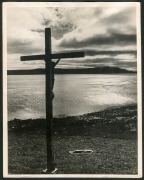 THE B.A.N.Z. ANTARCTIC EXPEDITION: Official original photograph by Captain Frank Hurley: Image A34 - Title: The Calvary erected on the lonely foreshore at Port Jeanne D'Arc. with official "MAWSON ANTARCTIC EXPEDITION" handstamp and release date "TUESDAY A