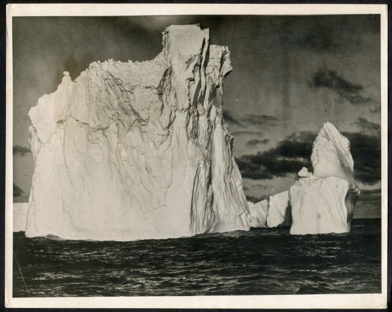 THE B.A.N.Z. ANTARCTIC EXPEDITION: Official original photograph by Captain Frank Hurley: Image A44 - Title: The Last Outpost. with official "MAWSON ANTARCTIC EXPEDITION" handstamp and release date "TUESDAY APR. 29, 1930" verso, together with the official