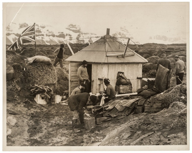 THE B.A.N.Z. ANTARCTIC EXPEDITION: Official original photograph by Captain Frank Hurley: Image A46 - Title: The abode of science on Heard Island. with official "MAWSON ANTARCTIC EXPEDITION" handstamp and release date "TUESDAY APR. 29, 1930" verso, togethe