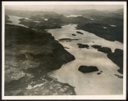 THE B.A.N.Z. ANTARCTIC EXPEDITION: Official original photograph by Captain Frank Hurley: Image A62 - Title: The World's most beautiful island. with official "MAWSON ANTARCTIC EXPEDITION" handstamp and release date "MONDAY MAY 12, 1930" verso, together wit