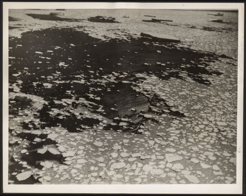 THE B.A.N.Z. ANTARCTIC EXPEDITION: Official original photograph by Captain Frank Hurley: Image A66 - Title: Ice-littered Antarctic Ocean. with official "MAWSON ANTARCTIC EXPEDITION" handstamp and release date "TUESDAY MAY 13, 1930" verso, together with of