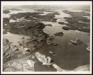 THE B.A.N.Z. ANTARCTIC EXPEDITION: Official original photograph by Captain Frank Hurley: Image A68 - Title: Kerguelen the Magnificent. with official "MAWSON ANTARCTIC EXPEDITION" handstamp and release date "TUESDAY MAY 13, 1930" verso, together with offic