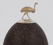 A sterling silver mounted emu egg ornament adorned with emu, kangaroo, cockatoo and possum, in glass dome on later timber base, stamped "Stg. Silver, Rocca", 25cm high - 2