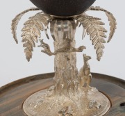 A sterling silver mounted emu egg ornament adorned with emu, kangaroo, cockatoo and possum, in glass dome on later timber base, stamped "Stg. Silver, Rocca", 25cm high - 5