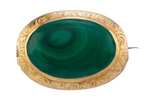 An 18ct gold antique oval brooch, set with polished malachite, circa 1870, 4.5cm wide