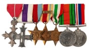 A WORLD WAR TWO MILITARY CROSS & M.B.E. GROUP to BRIGADIER R.H. FISHER. The Most Excellent Order of the British Empire (M.B.E.) 2nd type Military; Military Cross (G.R.I.) engraved to rear; 1939 Star; Africa Star with clasp 8th Army; Italy Star; Defence an