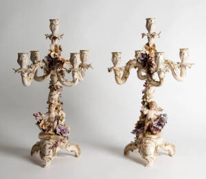Pair of German porcelain 5 branch candelabras with applied cherubs & floral decoration, late 19th century. 1200
