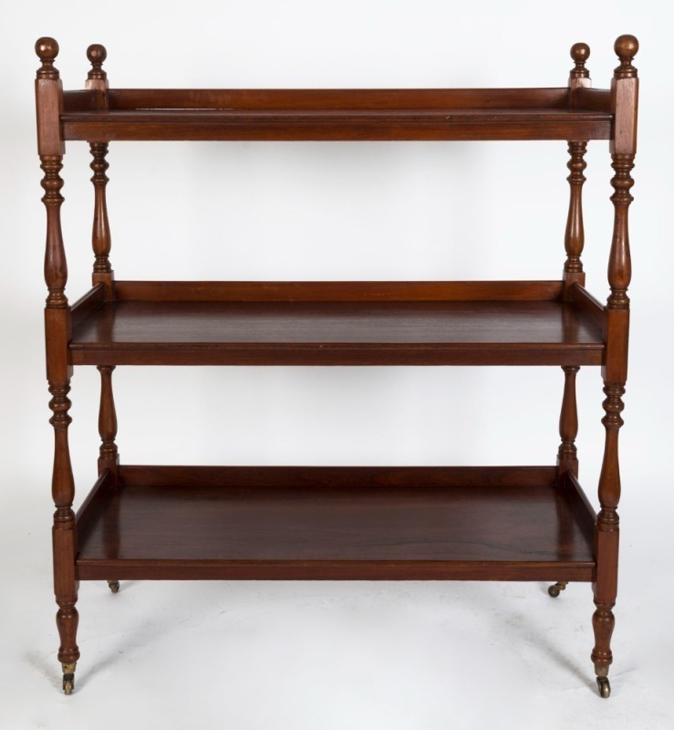 An antique Australian cedar three tier dumb waiter with ball finials, 19th century, 141cm high, 122cm wide, 50cm deep