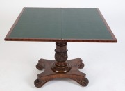 An impressive Colonial Australian cedar fold-over card table. Handsomely crafted in choice cuts of cedar with cross banded edge, cross grained ogee moulded frieze, finely carved and turned column, platform base and scrolling feet, Tasmanian origin, circa - 2