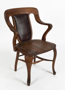 An antique Australian blackwood and mountain ash desk chair with crinoline stretchers, early 20th century, stamped "SIKES", ​​​​​​​93cm high, 62cm across the arms