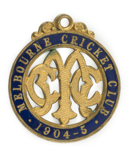 MELBOURNE CRICKET CLUB, 1904-5 Membership fob, made by Stokes, unusually, with dark blue enamel instead of the white which is usually seen. Without an impressed number, we believe this was a proposal submitted by Stokes. It was probably not adopted because it was almost identical to the 1903-4 design. This is the only example we have seen.