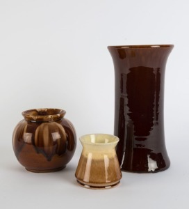 Three assorted brown glazed Australian pottery vases, including Bendigo Waverley Ware, Trent and Cornwell's, the largest 26cm high