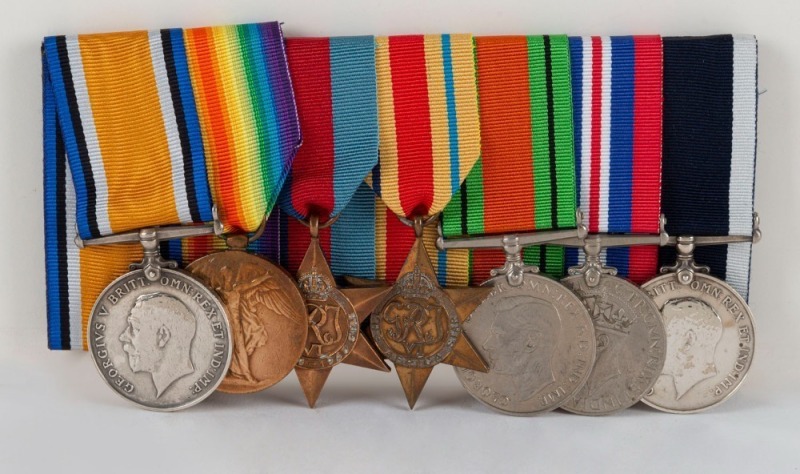 A group of medals to Petty Officer C.A.V. WINKWORTH, who served as a Royal Navy Boy Sailor in 1918 and who later served in submariners during World War Two. Comprising of 1914-18 British War and Victory Medals; 1939-45 Star; Africa Star; Defence and War M