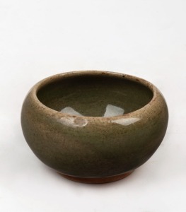 HAROLD HUGHAN green glazed pottery bowl, signed "Hughan, Stoneware, 12", with Glen Iris monogram, ​​​​​​​5cm high, 9cm diameter