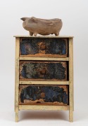 A Folk Art carved wooden pig together with a Folk Art miniature chest with painted finish, South Australian origin, 19th/20th century, the pig 23cm long, the chest 38cm high