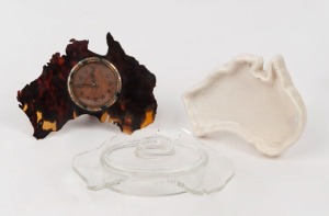 An Australiana tortoiseshell map clock, together with map ceramic dish and "1936 Centennial Adelaide Exhibition" dish, 20th century, (3 items), the largest 16cm wide 