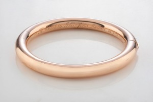 WILLIS & SON of Melbourne 9ct rose gold wax filled bangle with engraved endorsement dated 1905. 7.5cm diameter, internal 6cm diameter