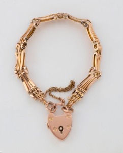 A 9ct gold gate-link bracelet with rose gold heart lock,