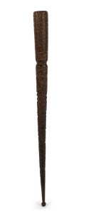 An antique Australian stock whip handle with ornately carved decoration, 19th century, 38cm long