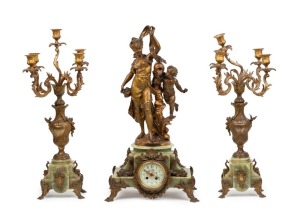 An impressive antique French three piece figural clock set, gilt metal and green onyx with eight day time and strike movement and candelabra garniture, 19th century, the clock 70cm high