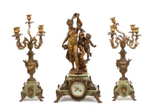 An impressive antique French three piece figural clock set, gilt metal and green onyx with eight day time and strike movement and candelabra garniture, 19th century, ​​​​​​​the clock 70cm high