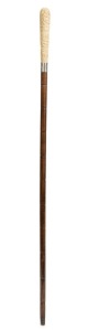 An antique walking stick with carved ivory handle, sterling silver presentation collar, rosewood shaft with brass ferrule, early 20th century, 90cm high