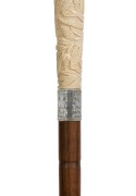 An antique walking stick with carved ivory handle, sterling silver presentation collar, rosewood shaft with brass ferrule, early 20th century, 90cm high - 2