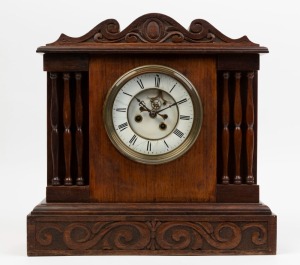 An antique French timber cased mantle clock with time and strike movement, open escapement and Roman numerals, 19th/20th century, 42cm high