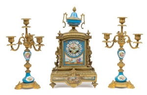An antique French three piece clock set in ormolu case with Sevres porcelain panels, eight day time and strike movement and candelabra garnitures, 19th century, 41cm high